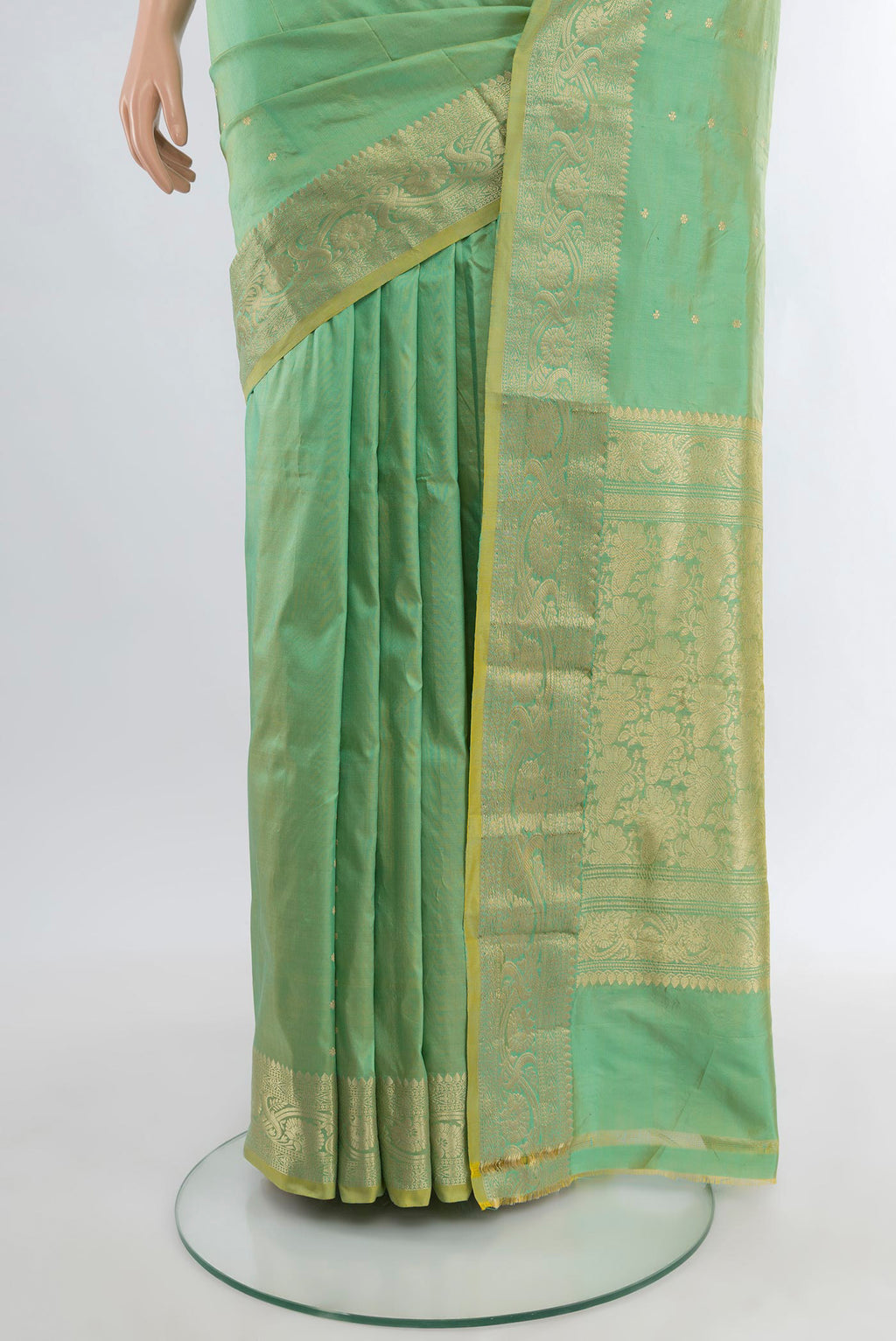 Pleats and pallu of Light Green Banarasi Katan Silk Saree with Zari Butta on the body and Zari Border. 