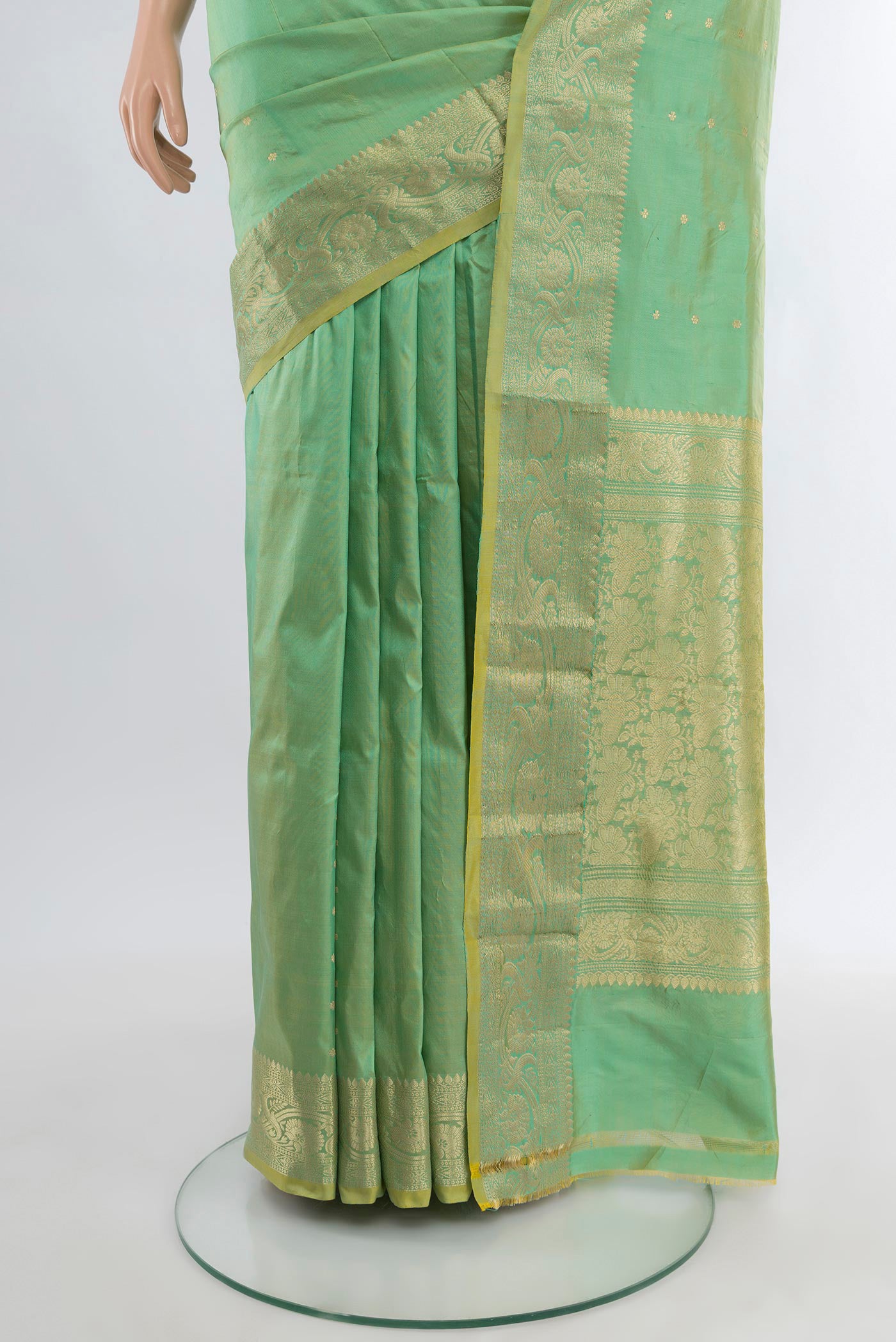 Pleats and pallu of Light Green Banarasi Katan Silk Saree with Zari Butta on the body and Zari Border. 