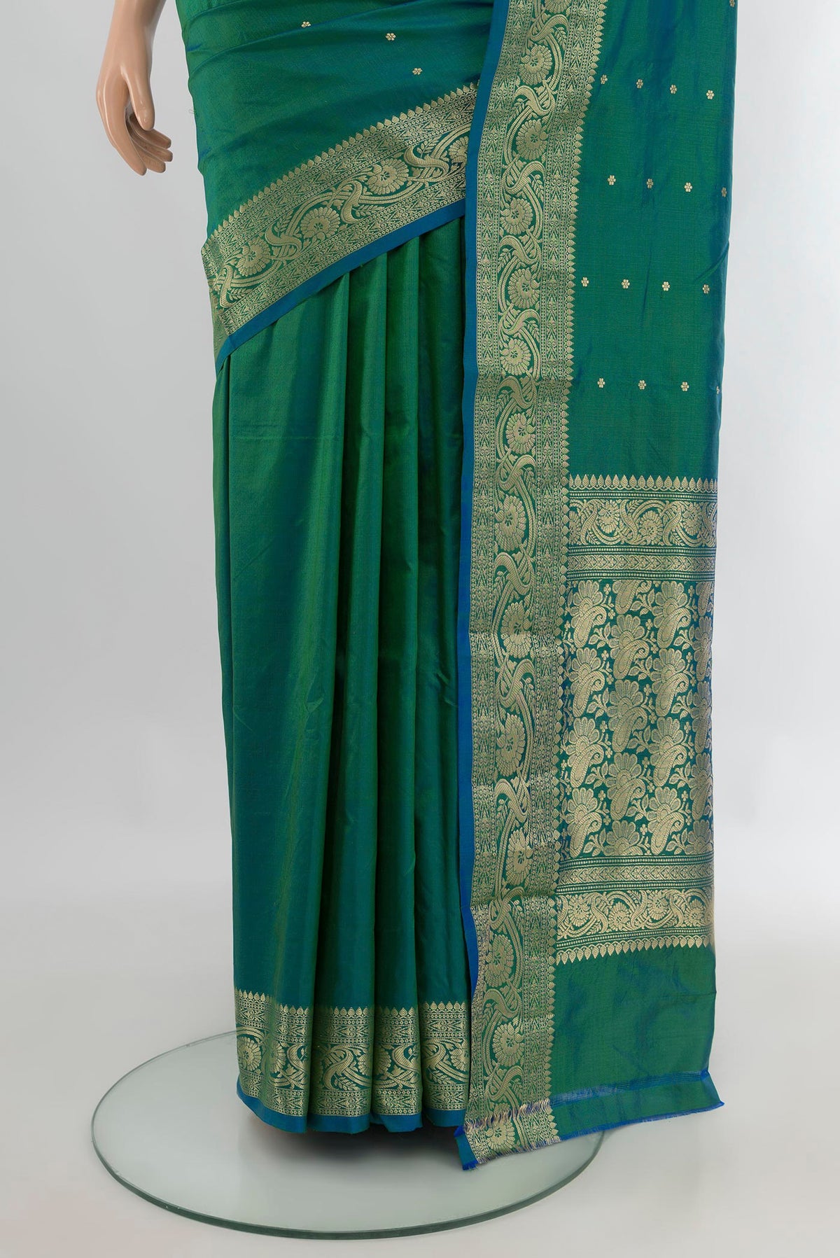 Pleats and pallu of Pure Silk Peacock Blue Dual Tone Banarasi Katan Saree with Zari Butta on the body and Zari Border. 