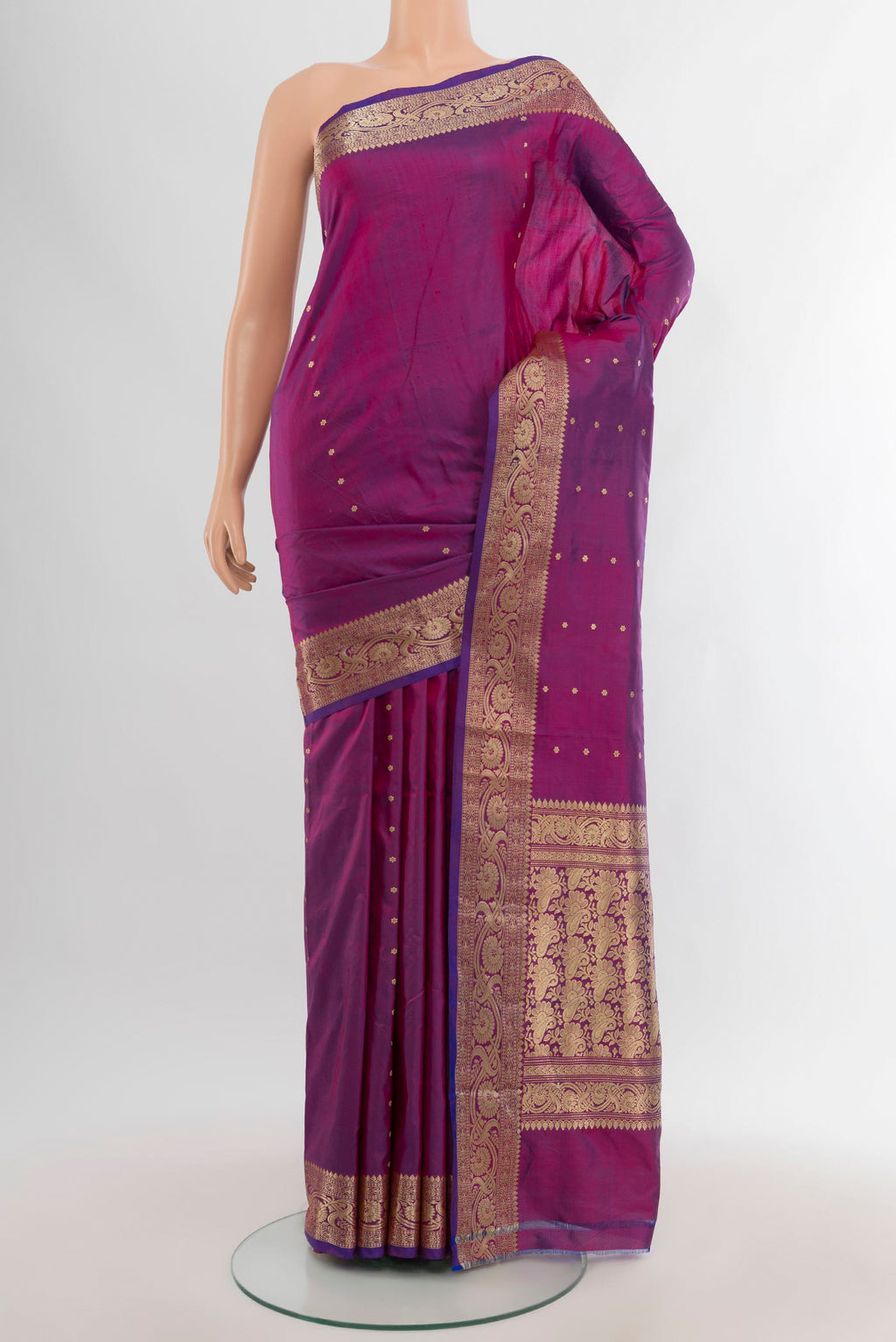Purple Banarasi Katan Silk Saree with Zari Butta on the body and Zari Border.  displayed on a mannequin
