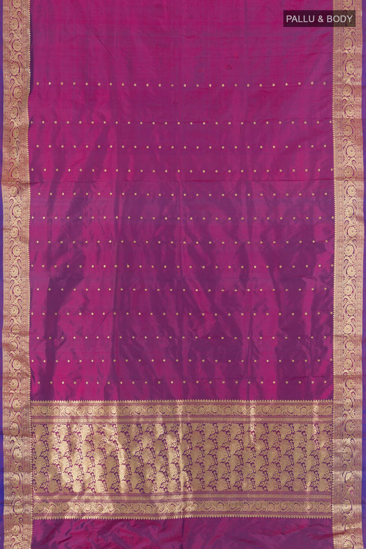 Flat view of Purple Banarasi Katan Silk Saree with Zari Butta on the body and Zari Border. 