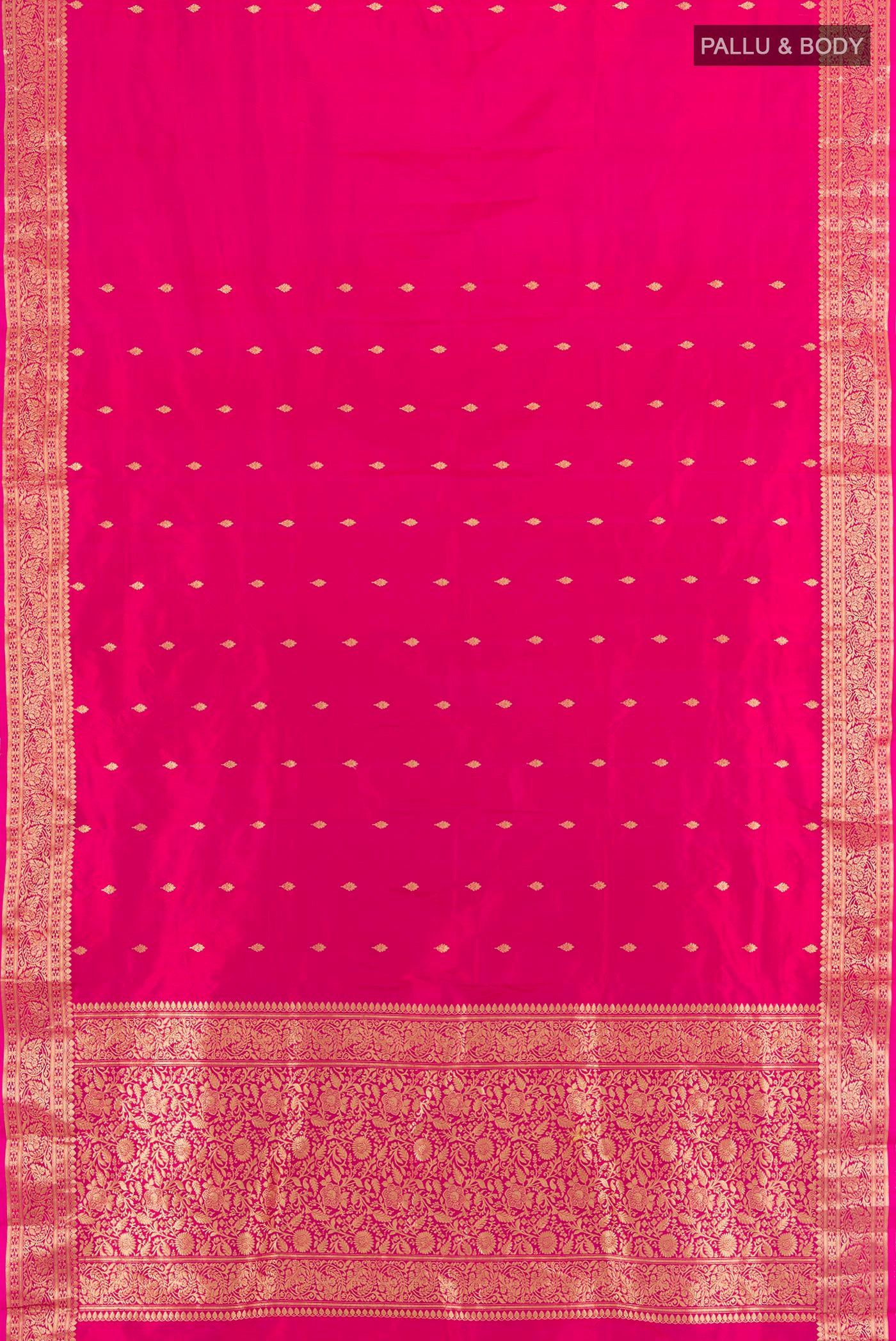 Flat view of Dark Pink Banarasi Katan Silk Saree with Zari Butta on the body and Zari Border. 