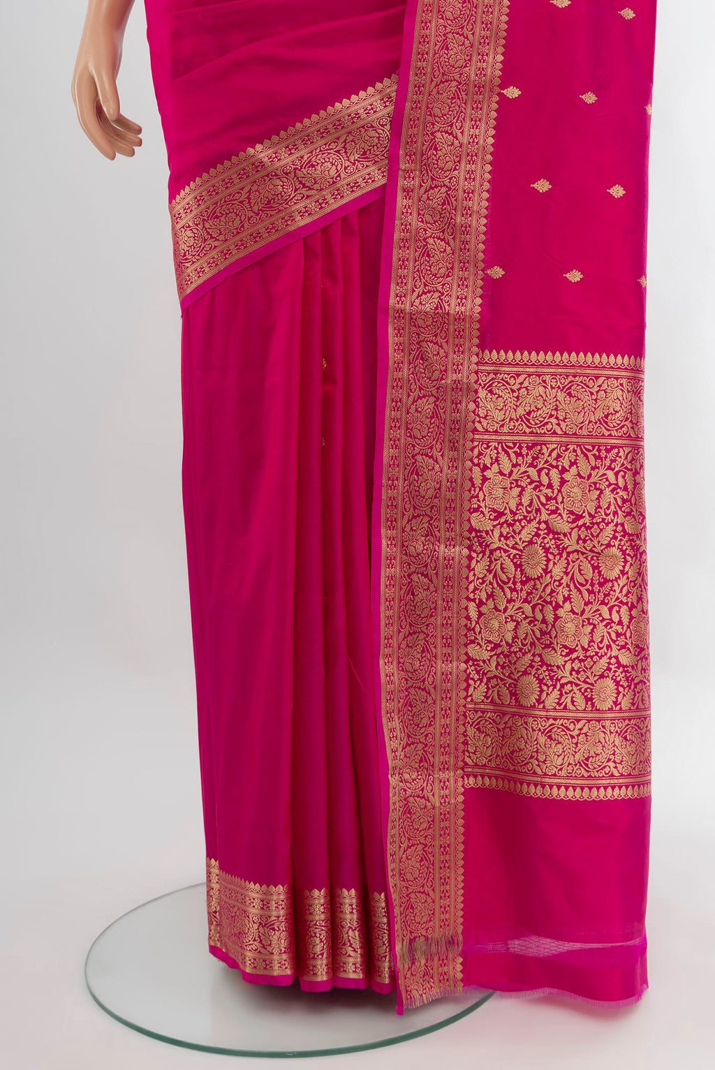 Pleats and pallu of Dark Pink Banarasi Katan Silk Saree with Zari Butta on the body and Zari Border. 