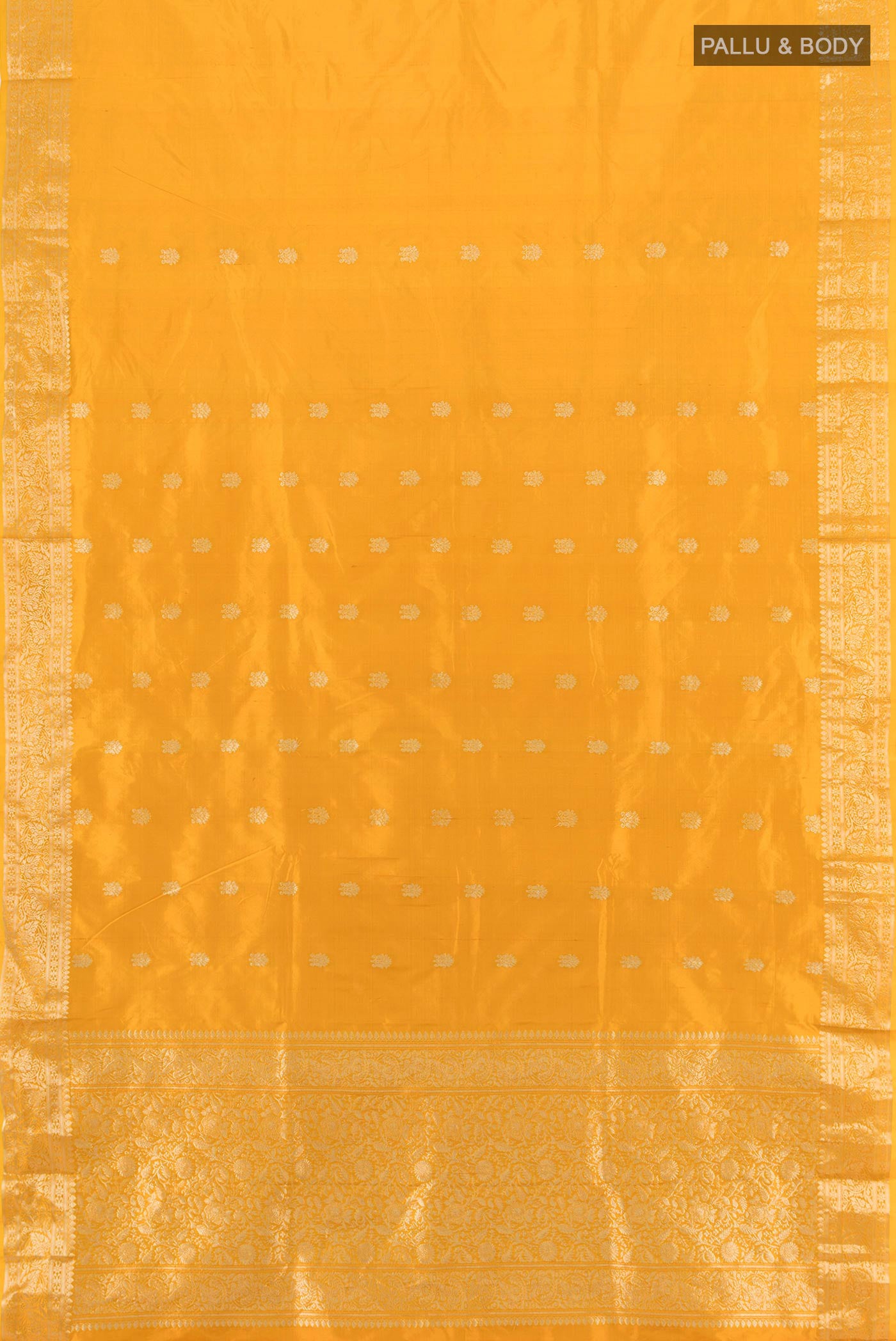 Flat view of Yellow Banarasi Katan Silk Saree with Zari Butta on the body and Zari Border. 