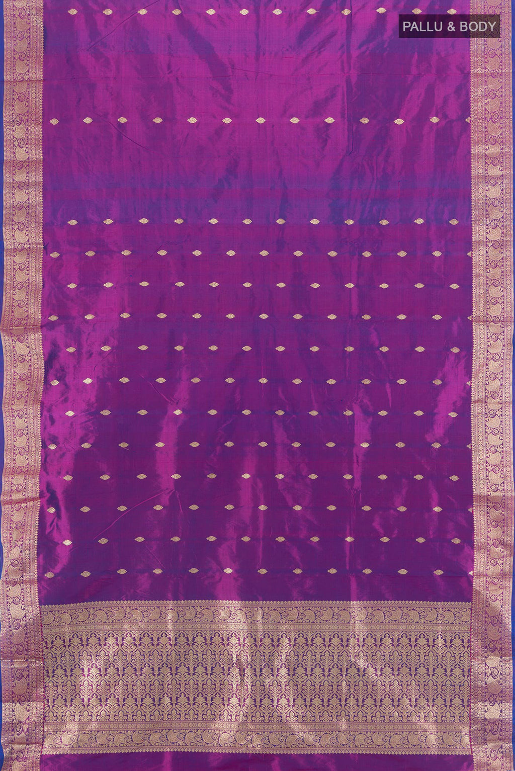 Flat view of Purple Banarasi Katan Silk Saree with Zari Butta on the body and Zari Border. 