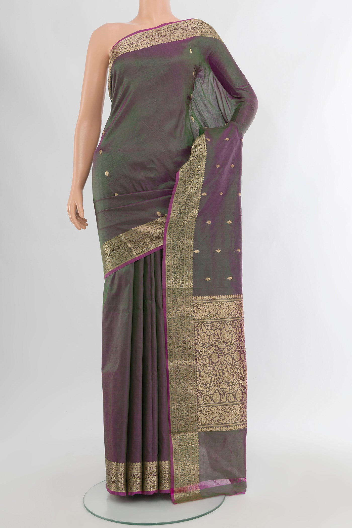 Multi Color Banarasi Katan Silk Saree with Zari Butta on the body and Zari Border.  displayed on a mannequin