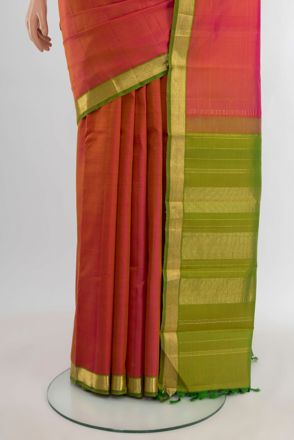 Pleats and pallu of Pink Kanjivaram Silk Saree with Plain Body and Zari Border. 