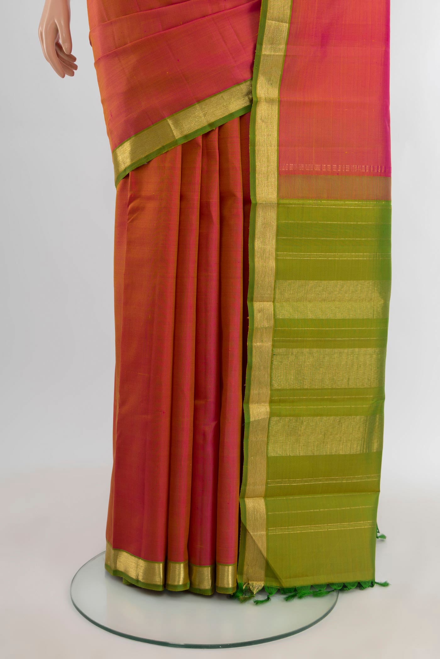Pleats and pallu of Pink Kanjivaram Silk Saree with Plain Body and Zari Border. 