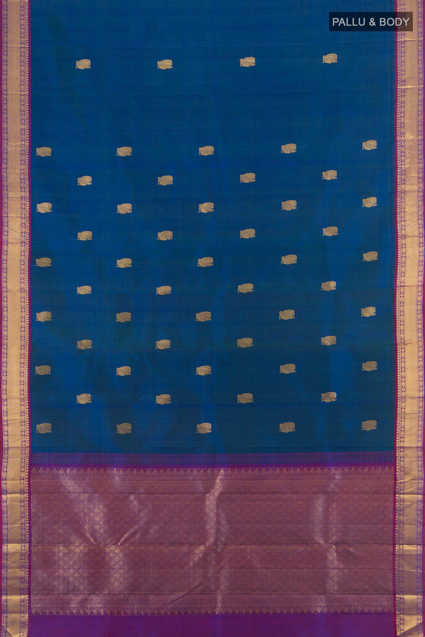 Flat view of Peacock Blue Kanjivaram Silk Saree with Zari Butta on the body and Zari Border. 