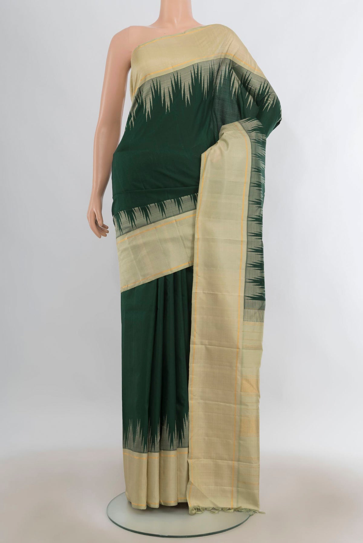 Pure Silk Bottle Green Kanjivaram Saree with Plain Body and Temple Border.  displayed on a mannequin