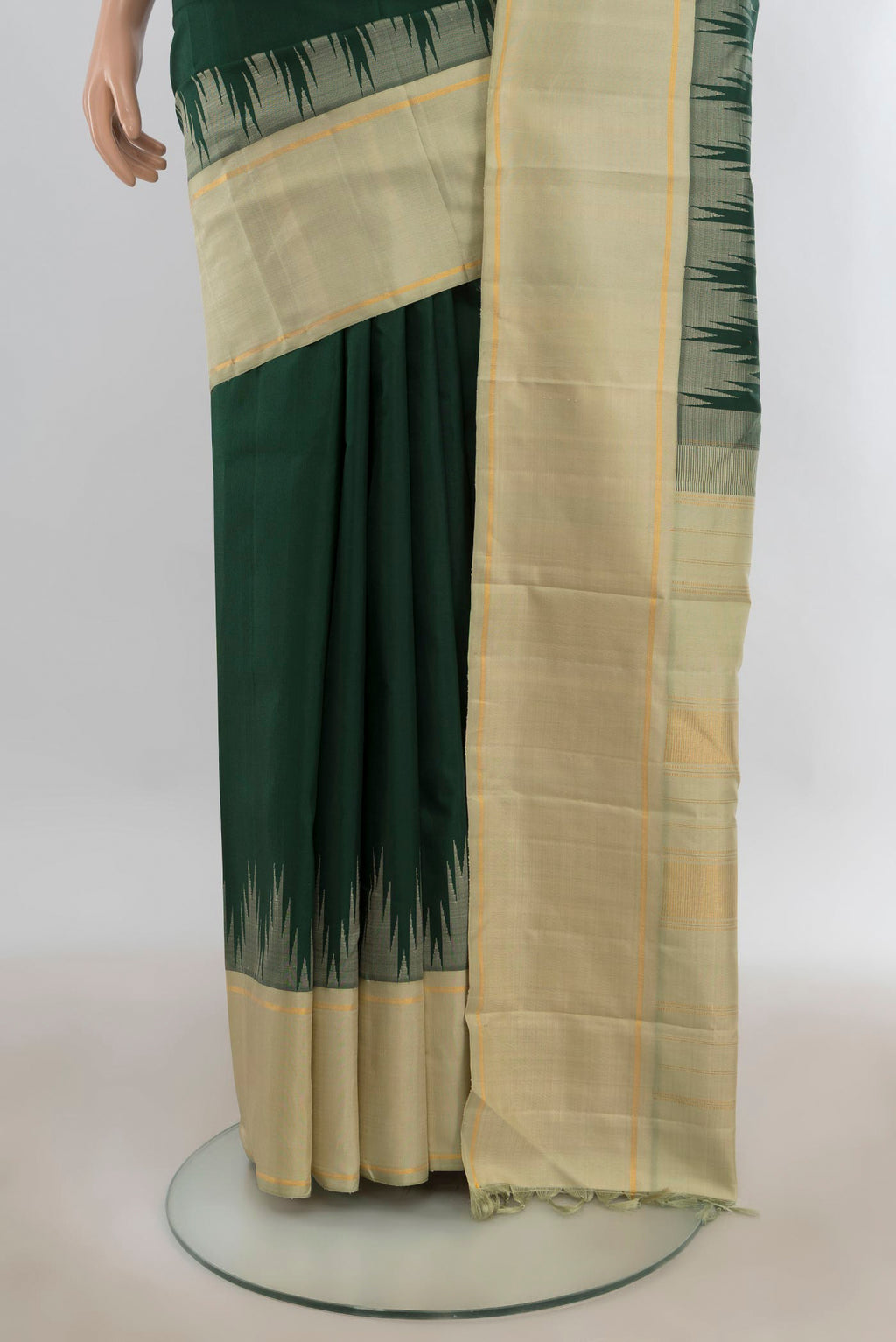 Pleats and pallu of Pure Silk Bottle Green Kanjivaram Saree with Plain Body and Temple Border. 