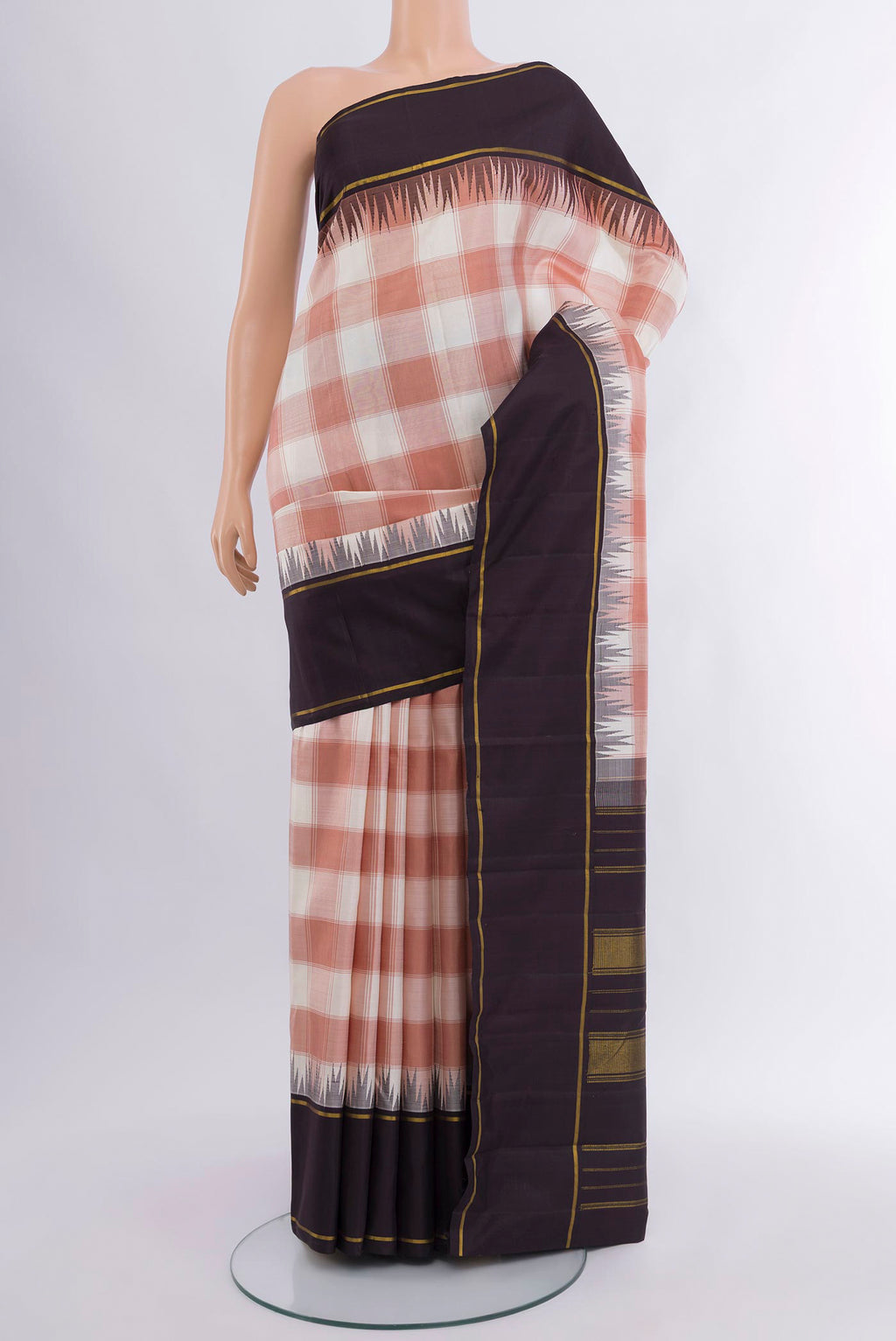 Multi Color Kanjivaram Silk Saree with Checked design on the body and Plain Border.  displayed on a mannequin