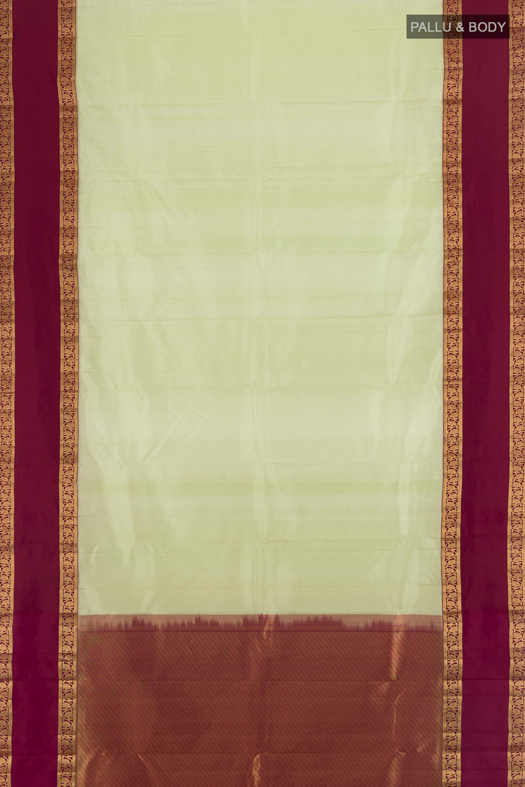 Flat view of Pista Green Kanchipuram Silk Saree with Plain Body and Zari Border. 