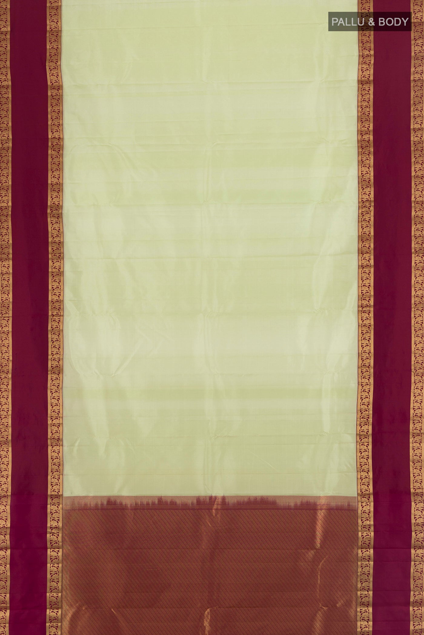 Flat view of Pista Green Kanchipuram Silk Saree with Plain Body and Zari Border. 