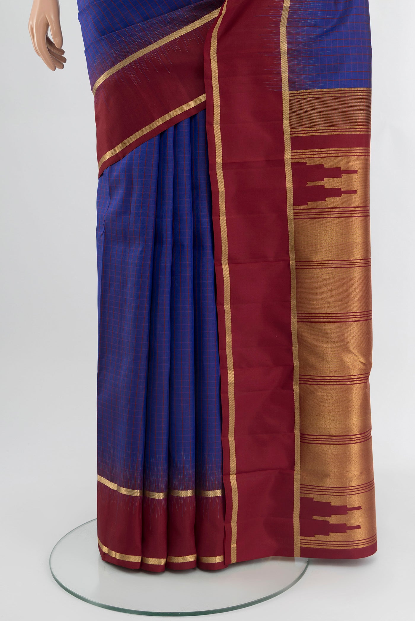 Pleats and pallu of Dark Blue Kanchipuram Silk Saree with Stripes on the body and Plain Border. 