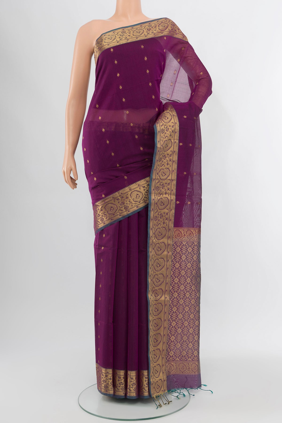 Purple Silk Cotton Saree with Zari Butta on the body and Zari Border.  displayed on a mannequin