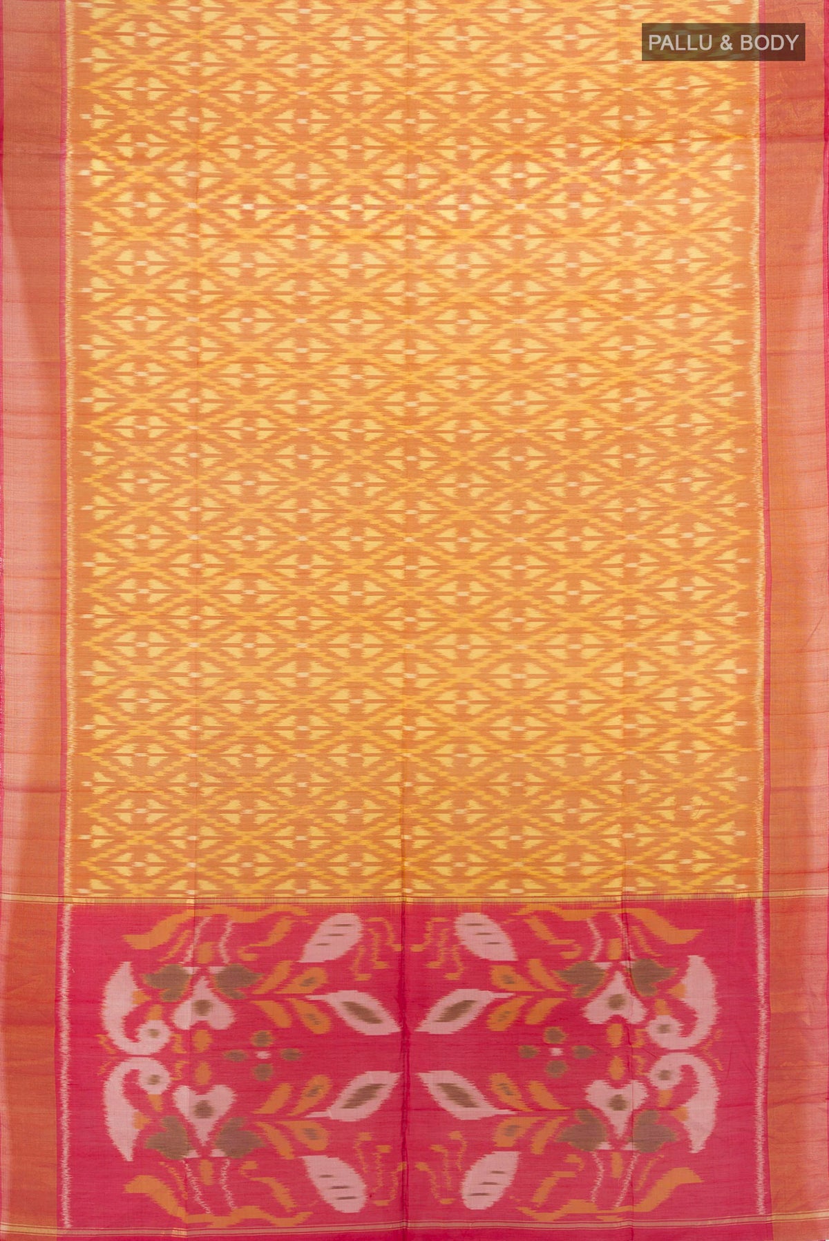 Flat view of Yellow Silk Cotton Saree with Ikat design on the body and Zari Border. 