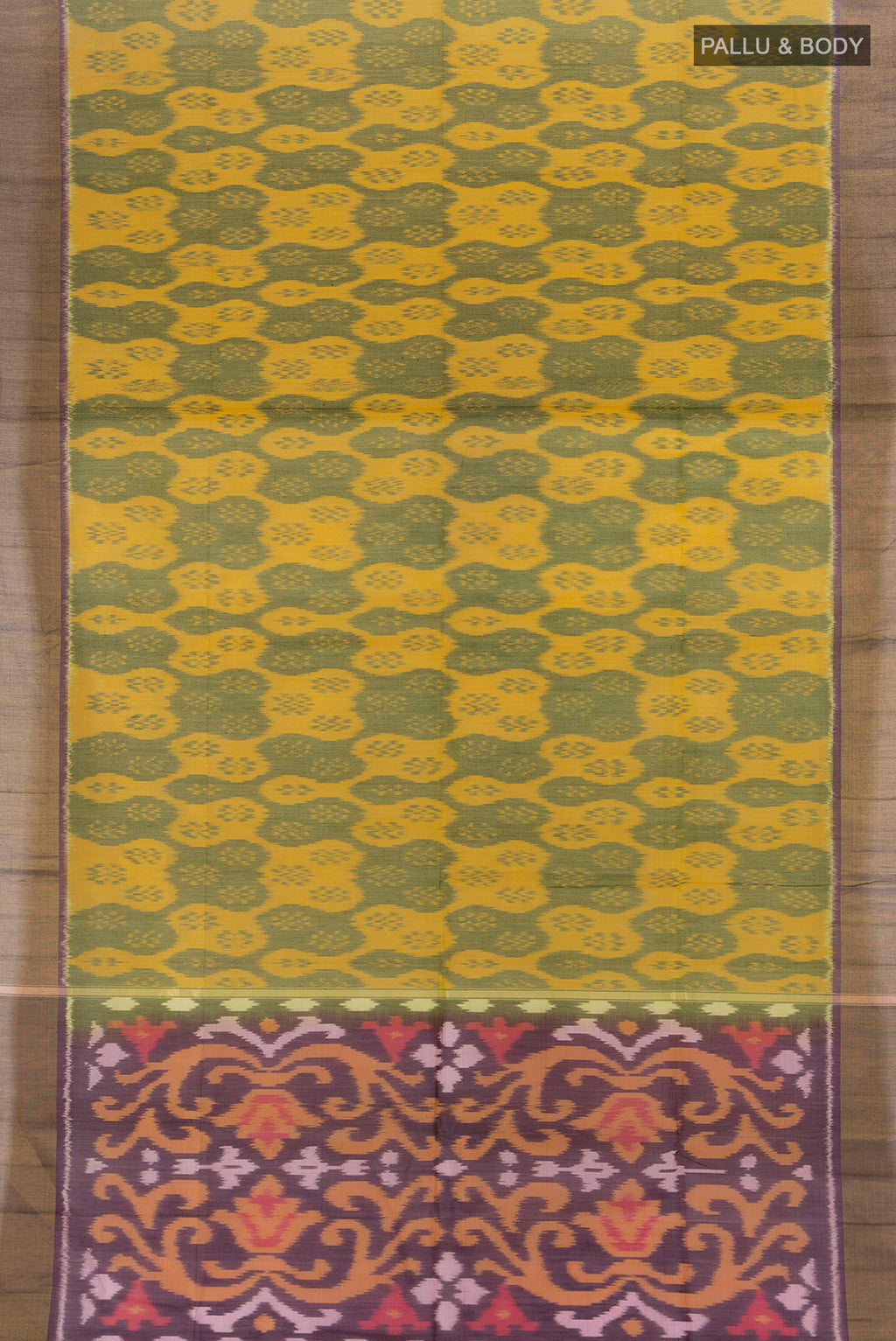 Flat view of Yellow Silk Cotton Saree with Ikat Print on the body and Zari Border. 