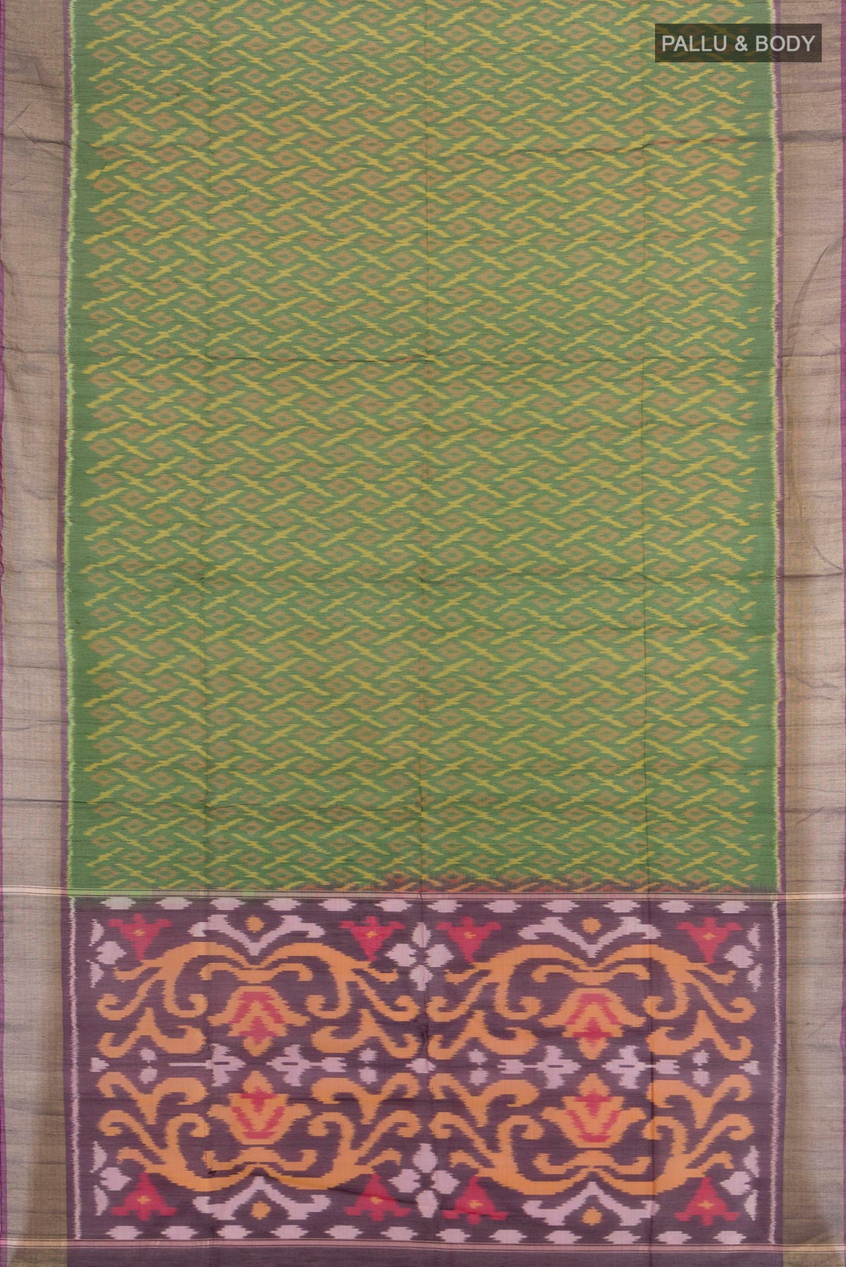 Flat view of Green Silk Cotton Saree with Ikat Print on the body and Zari Border. 