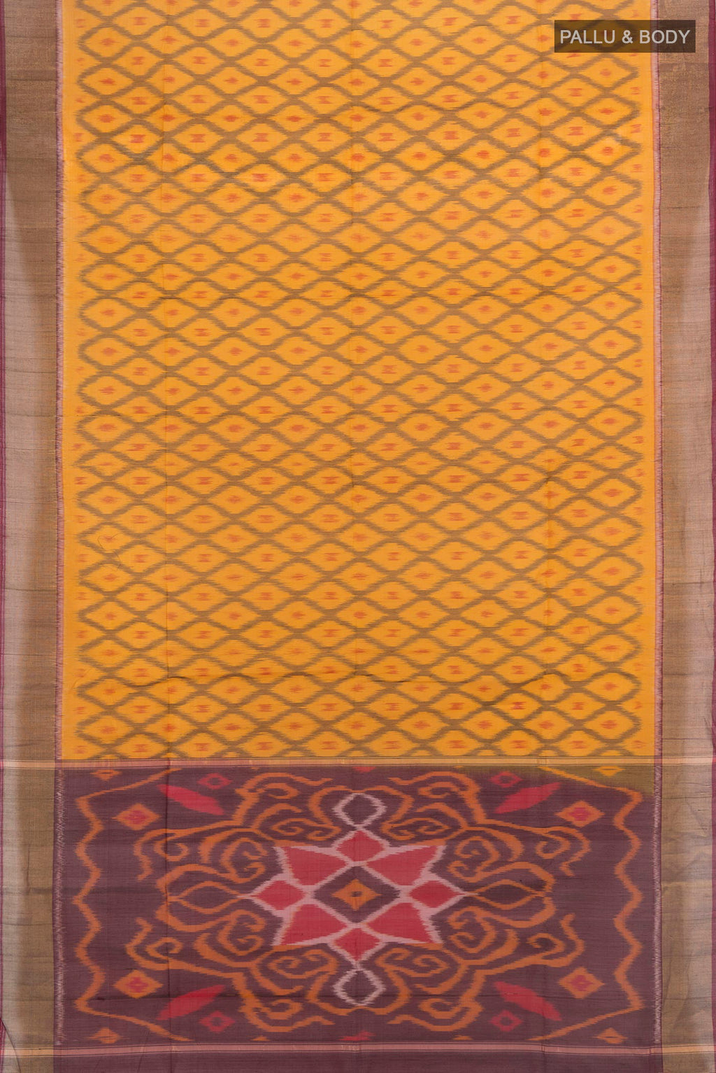 Flat view of Yellow Silk Cotton Saree with Ikat design on the body and Zari Border. 