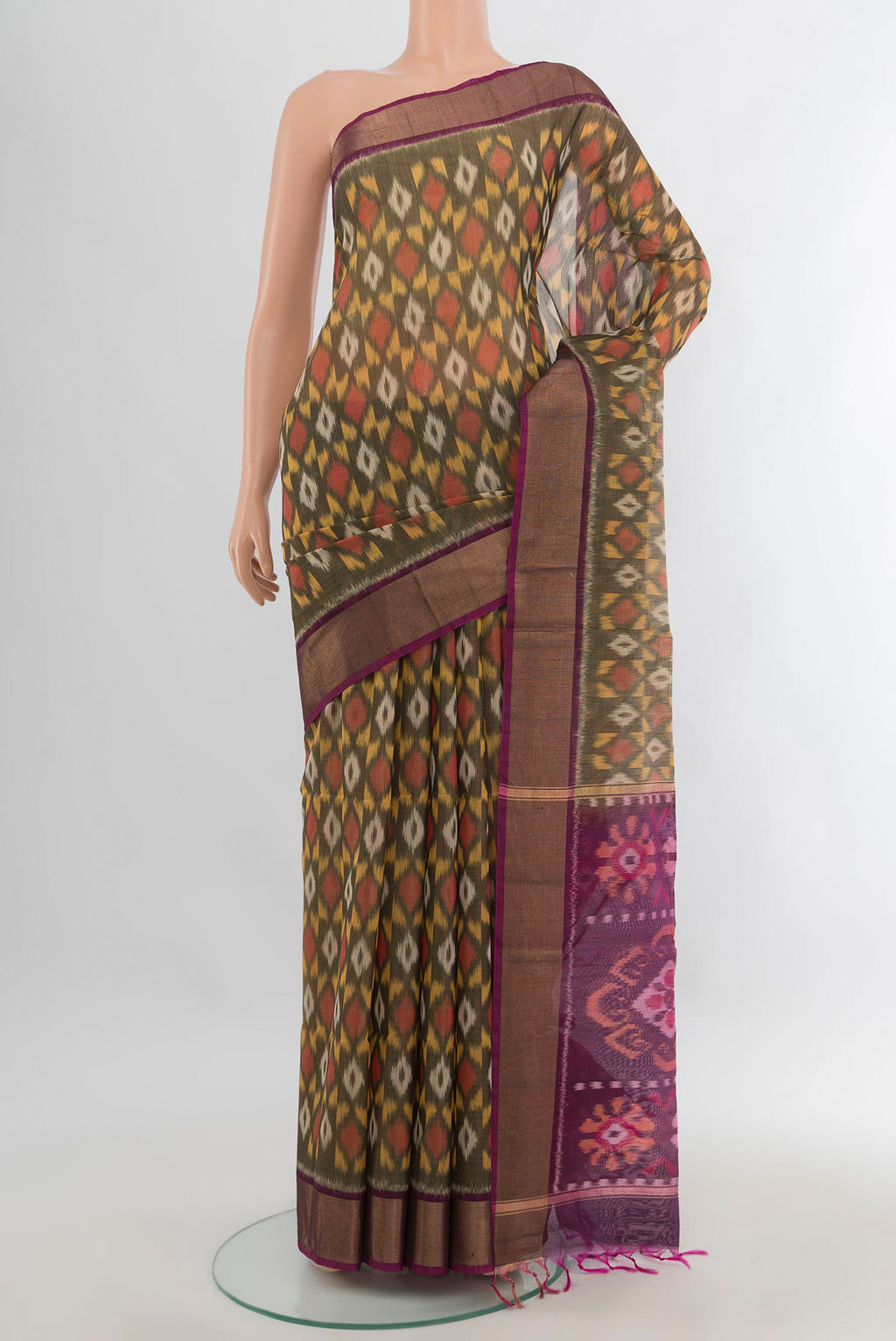 Davys Grey Silk Cotton Saree with Ikat design on the body and Zari Border.  displayed on a mannequin