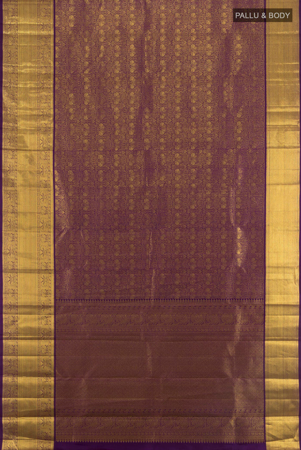 Flat view of Violet Kanchipuram Silk Saree with Zari Brocade on the body and Zari Border. 