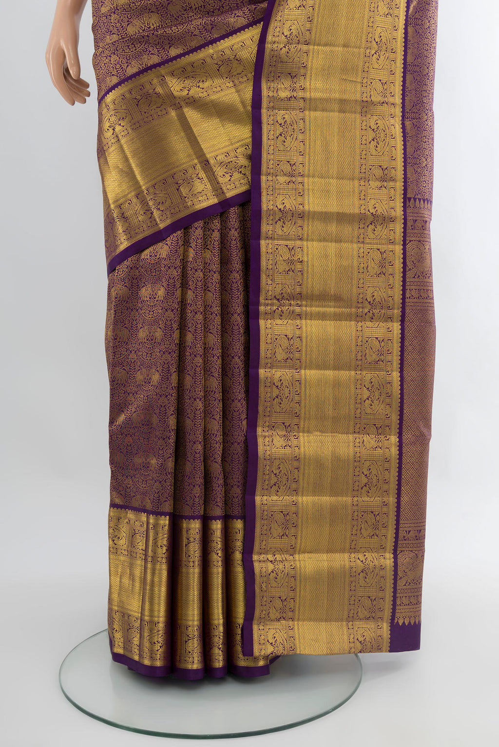 Pleats and pallu of Violet Kanchipuram Silk Saree with Zari Brocade on the body and Zari Border. 