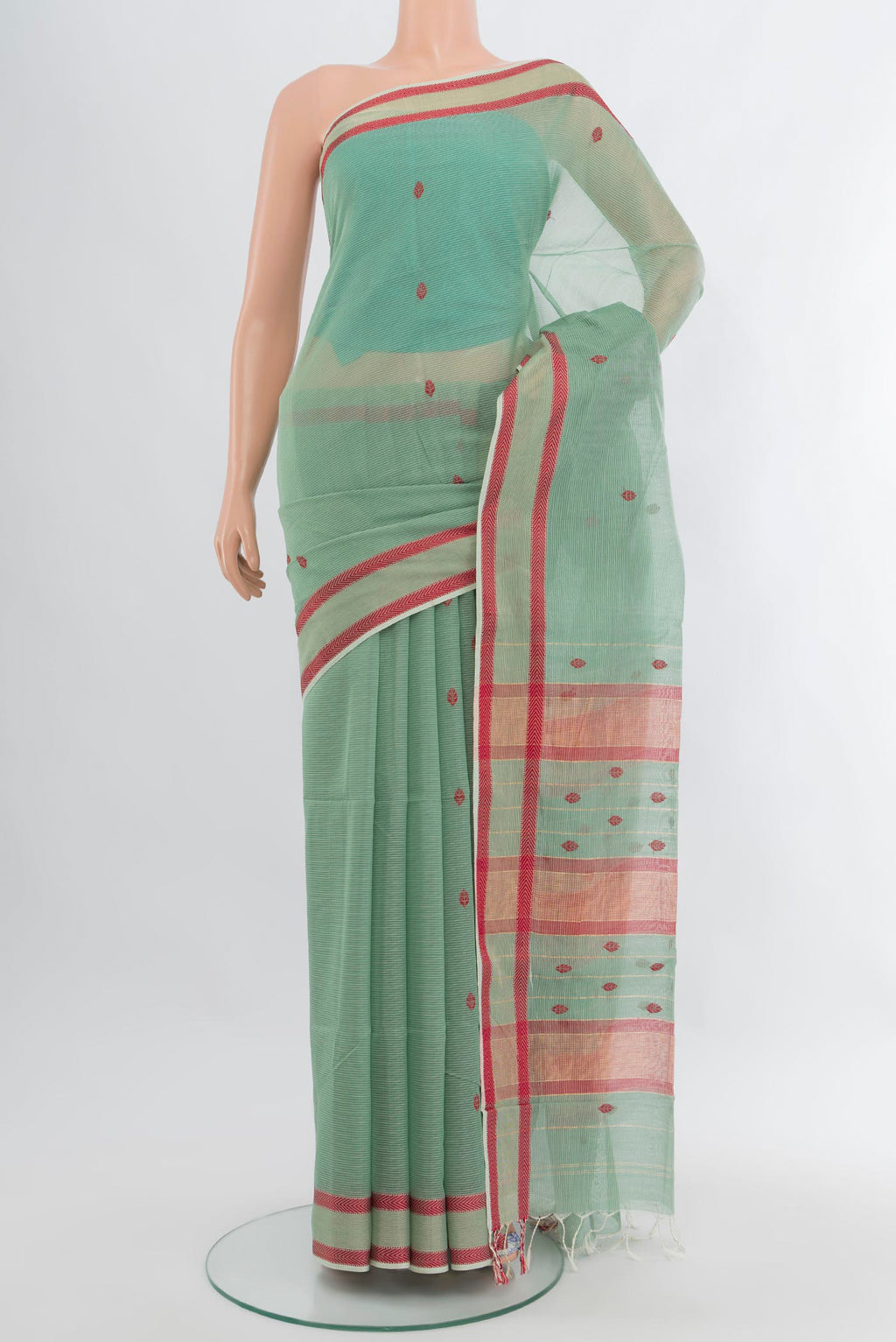 Light Blue Maheshwari Silk Cotton Saree with Thread Butta on the body and Thread Border.  displayed on a mannequin