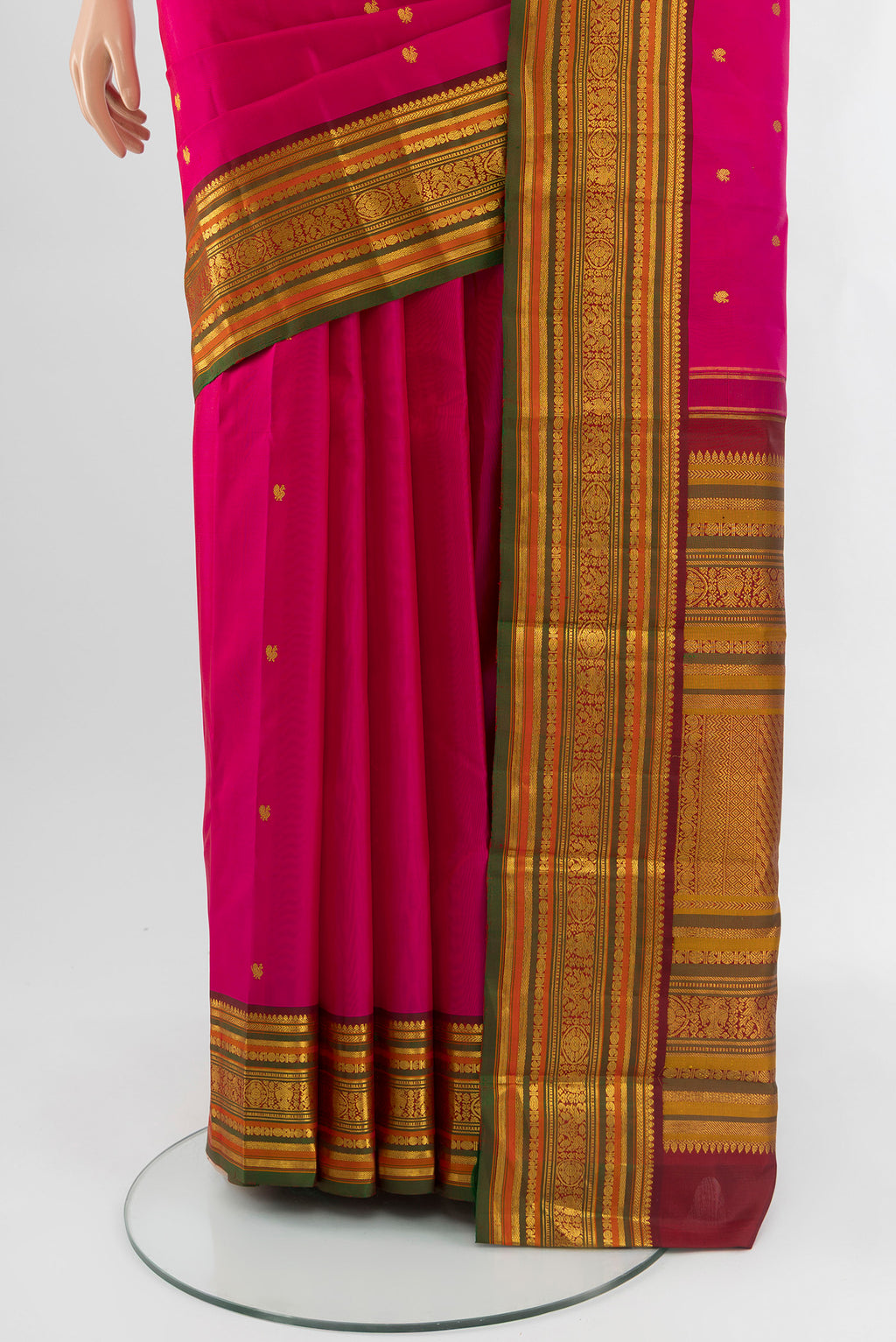 Pleats and pallu of Pink Kanjivaram Silk Saree with Zari Butta on the body and Zari Border. 