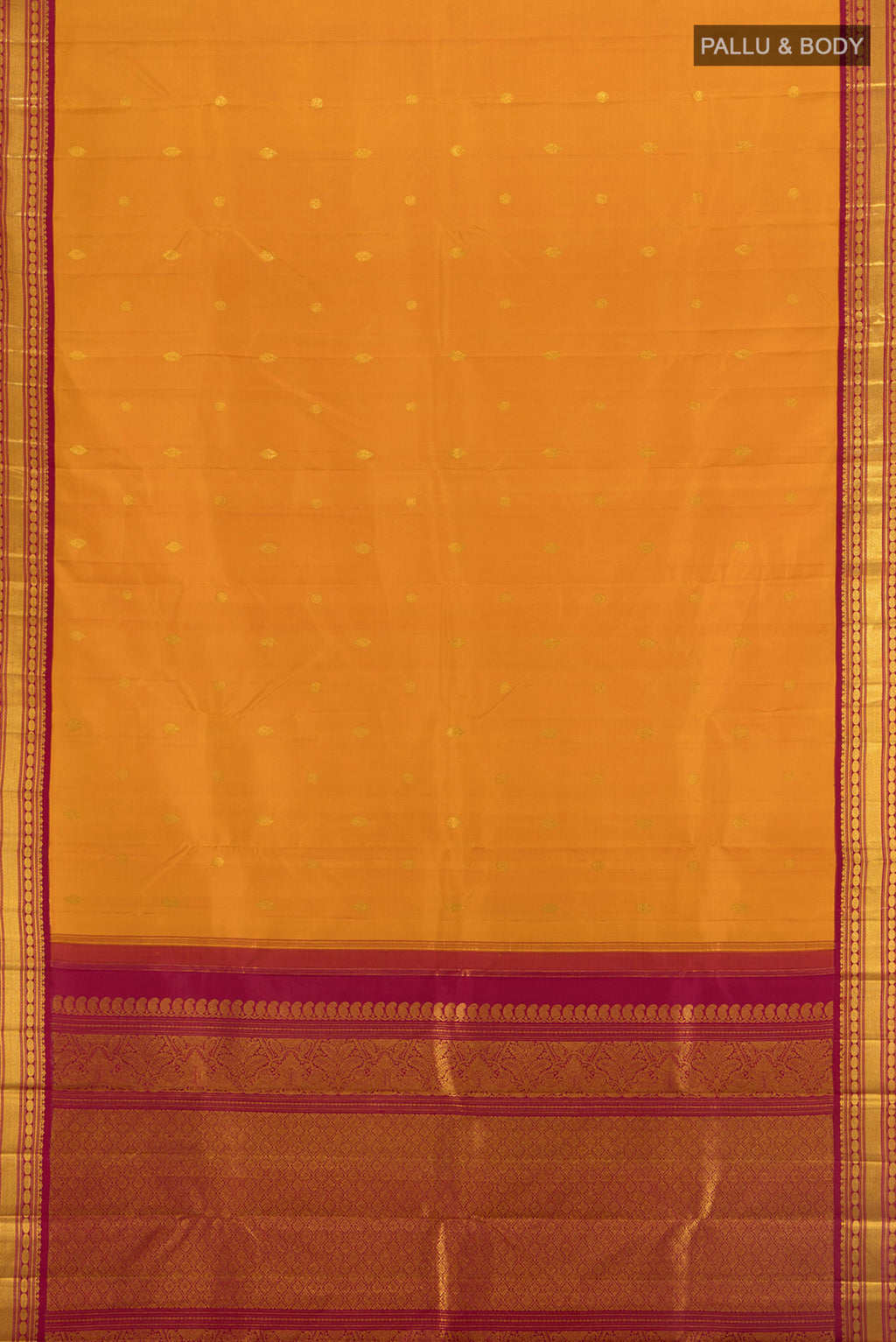 Flat view of Mustard Kanchipuram Silk Saree with Zari Butta on the body and Zari Border. 