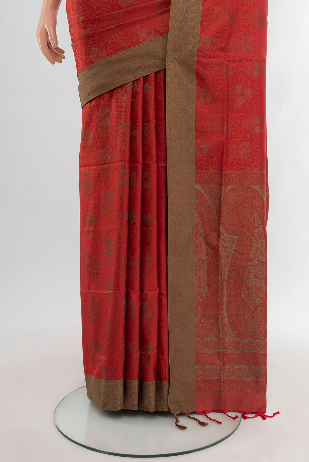 Pleats and pallu of Rust Soft Silk Saree with Jacquard design on the body and Thread Border. 