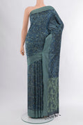 Black Soft Silk Saree with Jacquard design on the body and Thread Border.  displayed on a mannequin