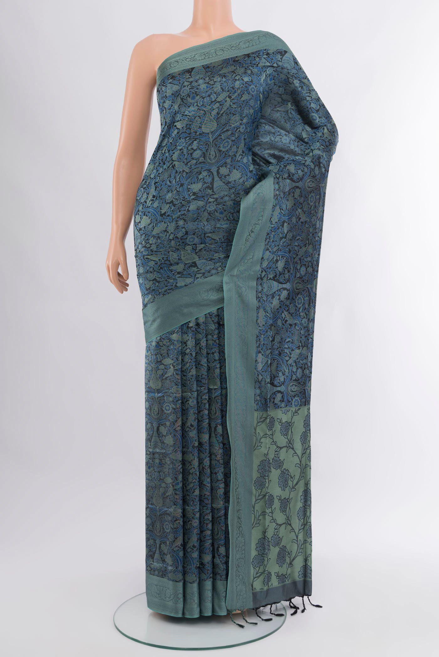 Black Soft Silk Saree with Jacquard design on the body and Thread Border.  displayed on a mannequin