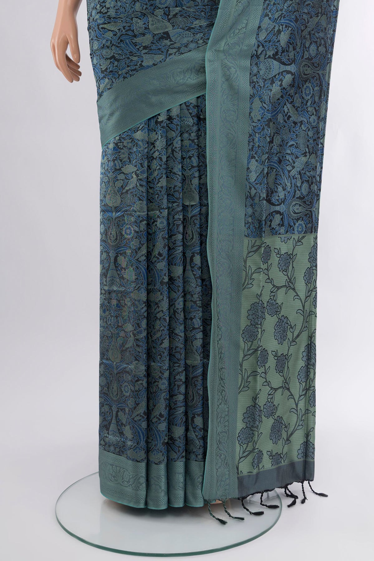 Pleats and pallu of Black Soft Silk Saree with Jacquard design on the body and Thread Border. 