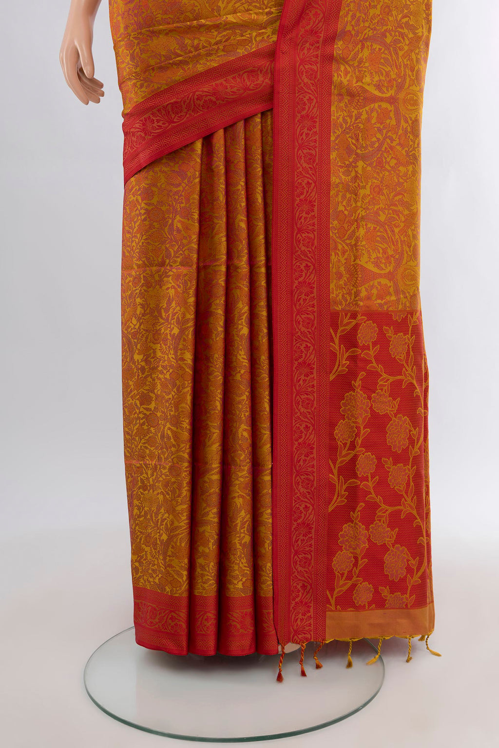 Pleats and pallu of Mustard Soft Silk Saree with Jacquard design on the body and Thread Border. 