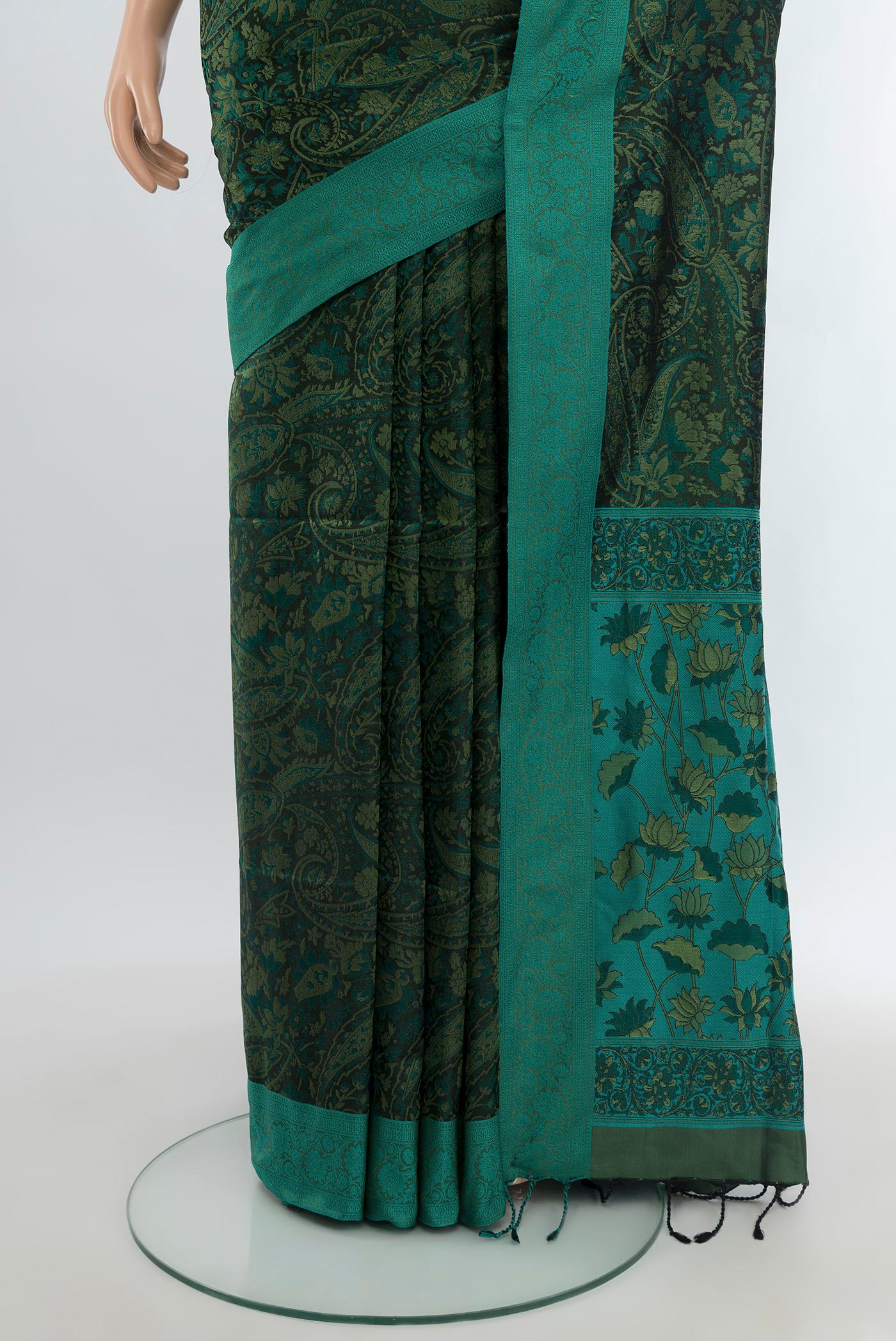 Pleats and pallu of Bottle Green Soft Silk Saree with Jacquard design on the body and Thread Border. 