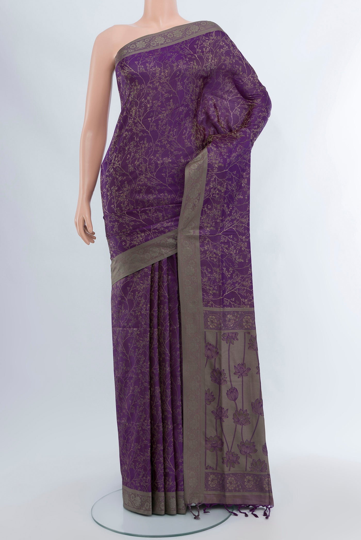 Violet Soft Silk Saree with Thread Butta on the body and Silk Border.  displayed on a mannequin