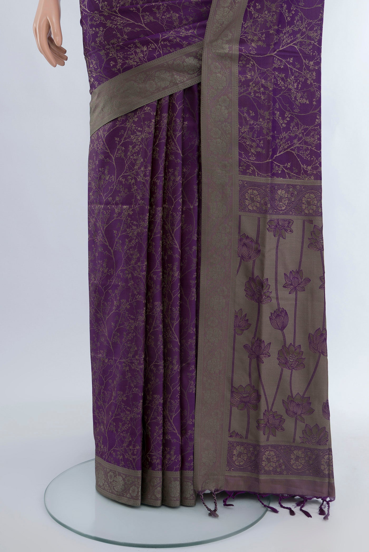 Pleats and pallu of Violet Soft Silk Saree with Thread Butta on the body and Silk Border. 