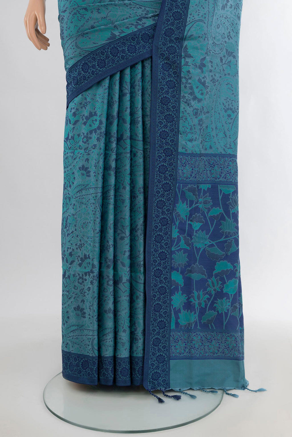Pleats and pallu of Grey Soft Silk Saree with Jacquard design on the body and Thread Border. 