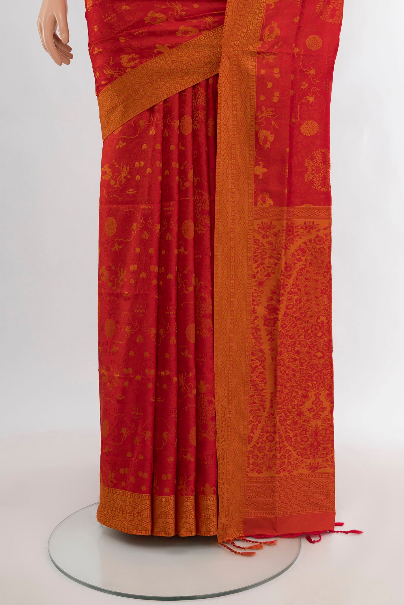 Pleats and pallu of Red Soft Silk Saree with Jacquard design on the body and Thread Border. 