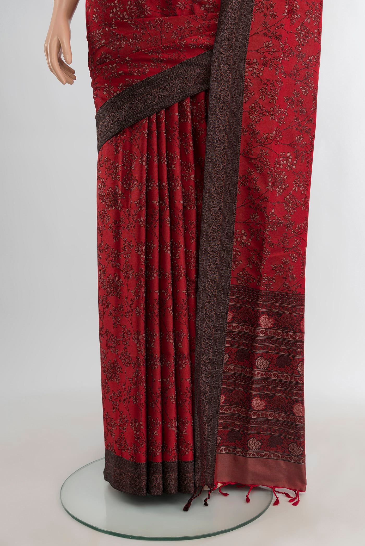 Pleats and pallu of Maroon Soft Silk Saree with Jacquard design on the body and Thread Border. 