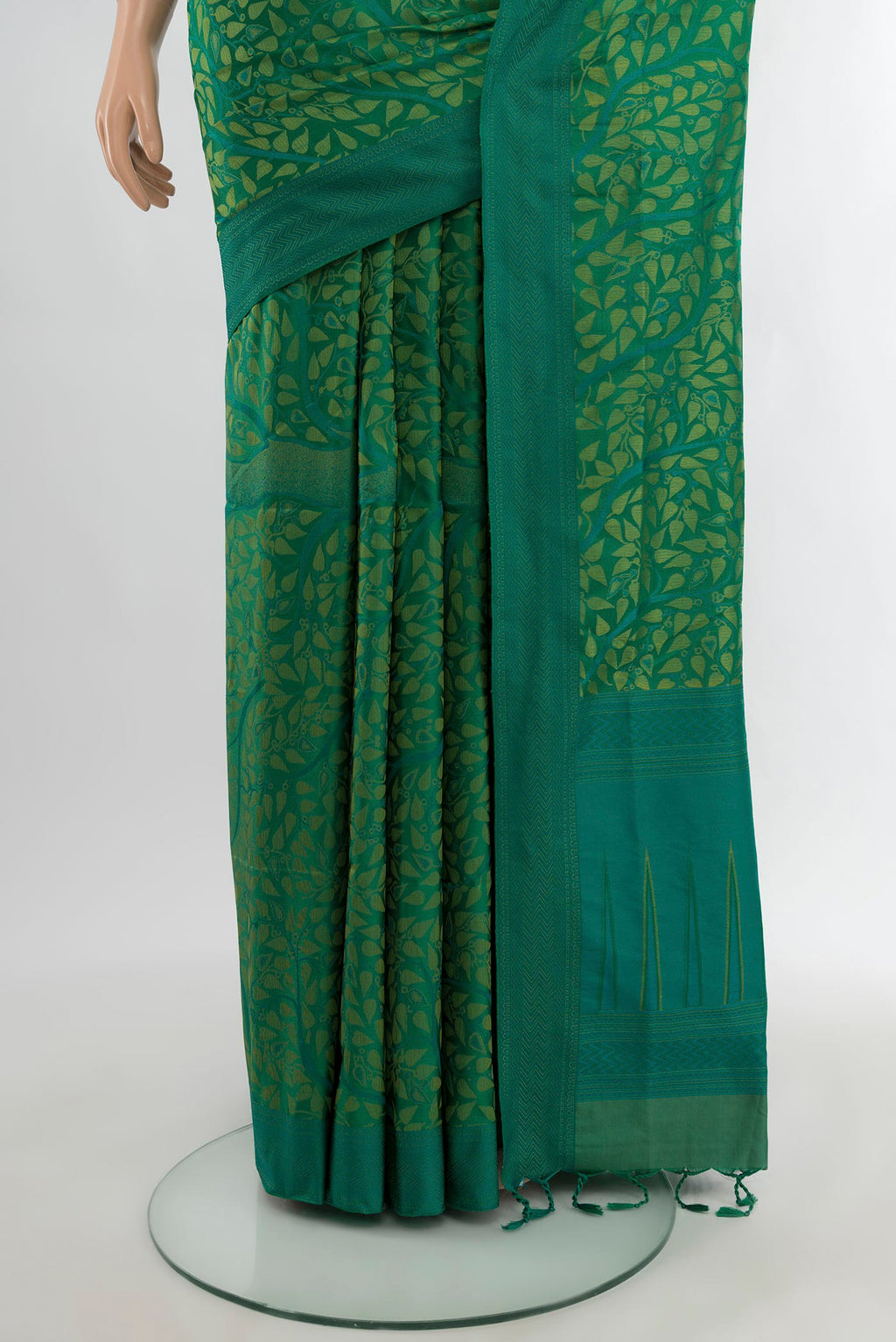 Pleats and pallu of Green Soft Silk Saree with Jacquard design on the body and Thread Border. 