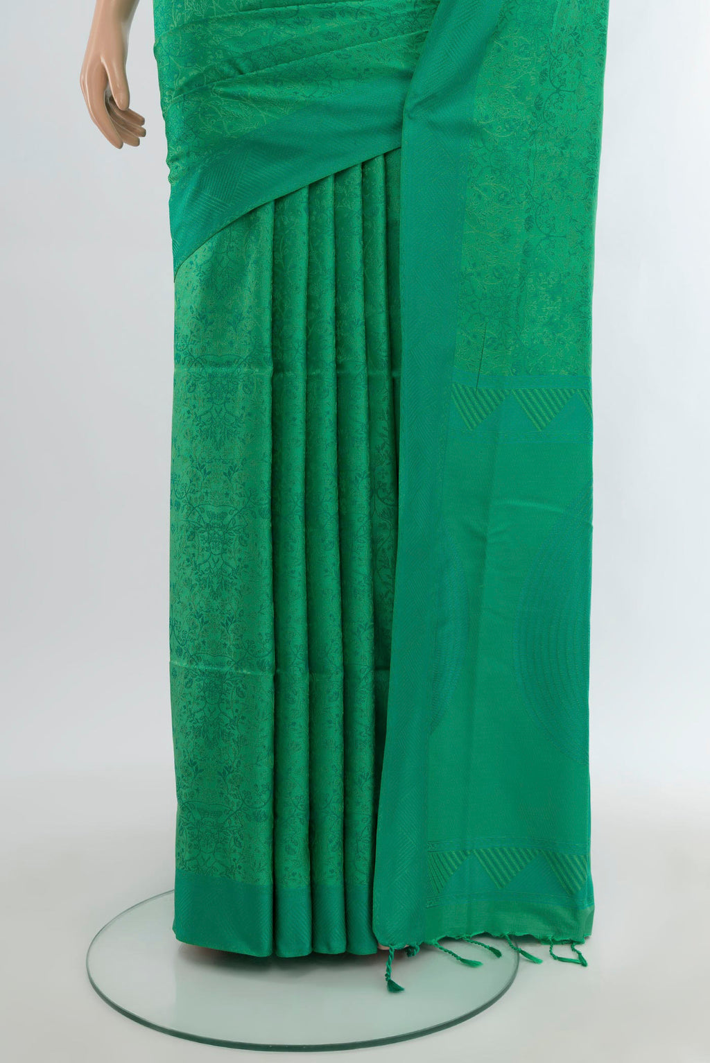 Pleats and pallu of Green Soft Silk Saree with Jacquard design on the body and Thread Border. 
