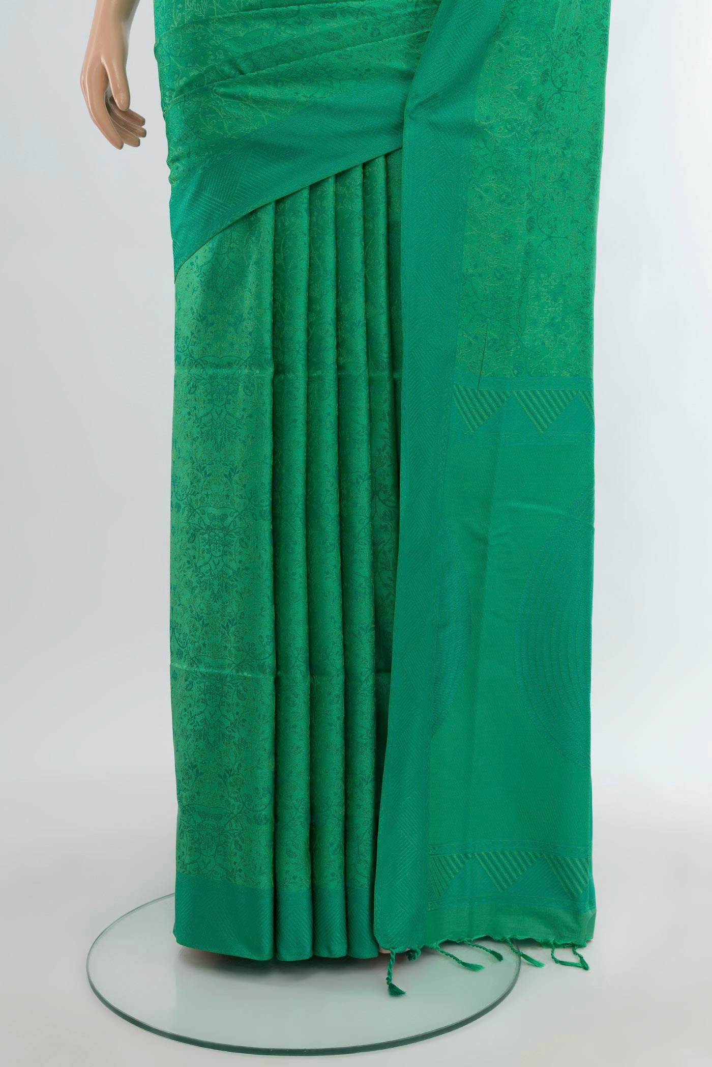 Pleats and pallu of Green Soft Silk Saree with Jacquard design on the body and Thread Border. 