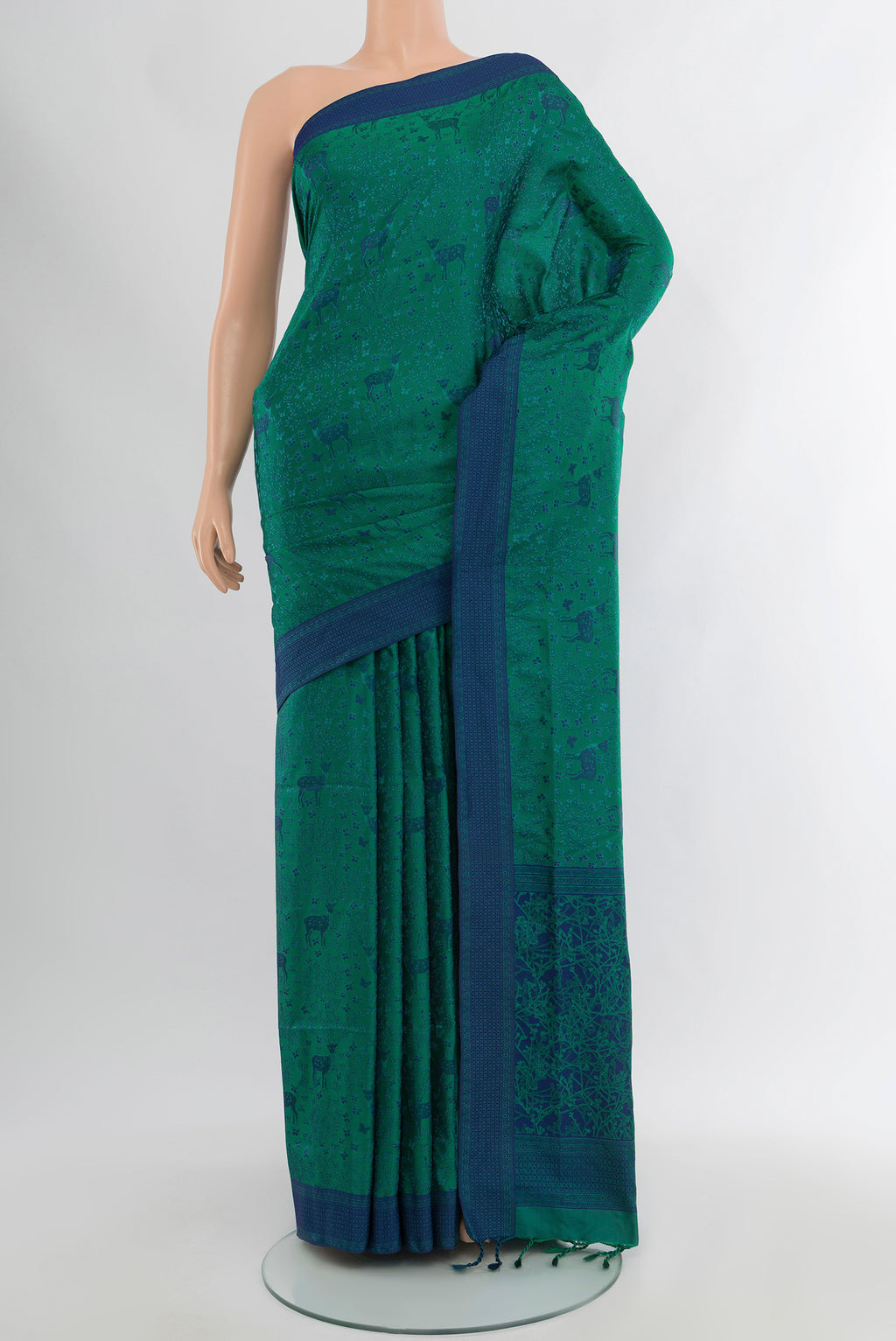 Sea Green Soft Silk Saree with Jacquard design on the body and Thread Border.  displayed on a mannequin