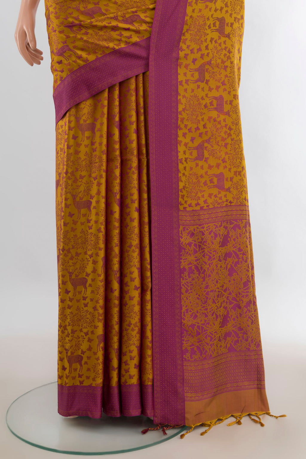 Pleats and pallu of Pure Silk Mustard Soft Saree with Jacquard design on the body and Thread Border. 