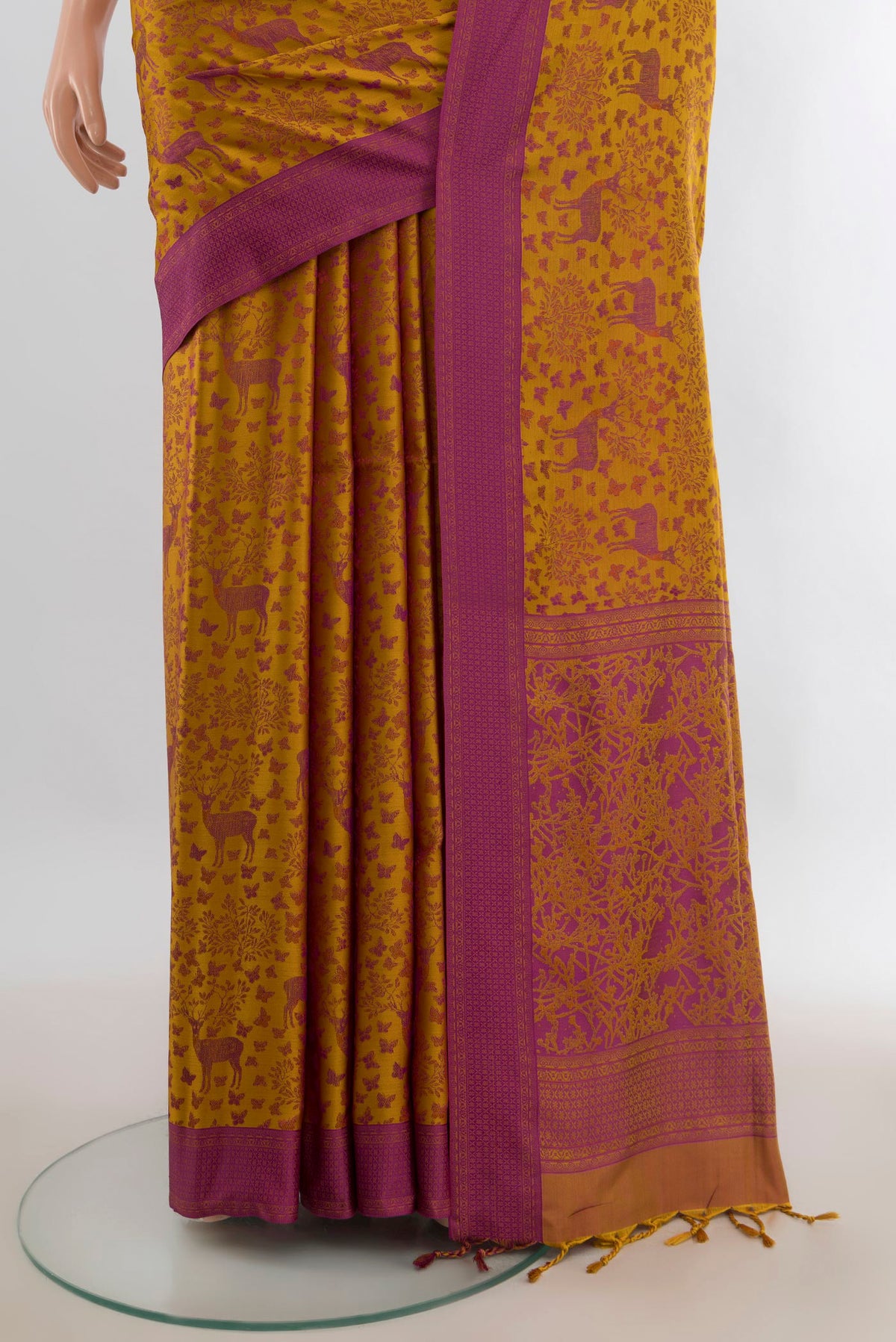 Pleats and pallu of Pure Silk Mustard Soft Saree with Jacquard design on the body and Thread Border. 
