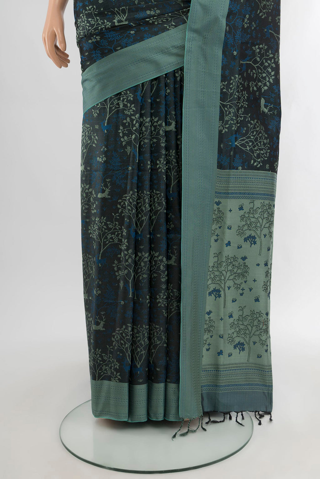 Pleats and pallu of Black Soft Silk Saree with Jacquard design on the body and Thread Border. 