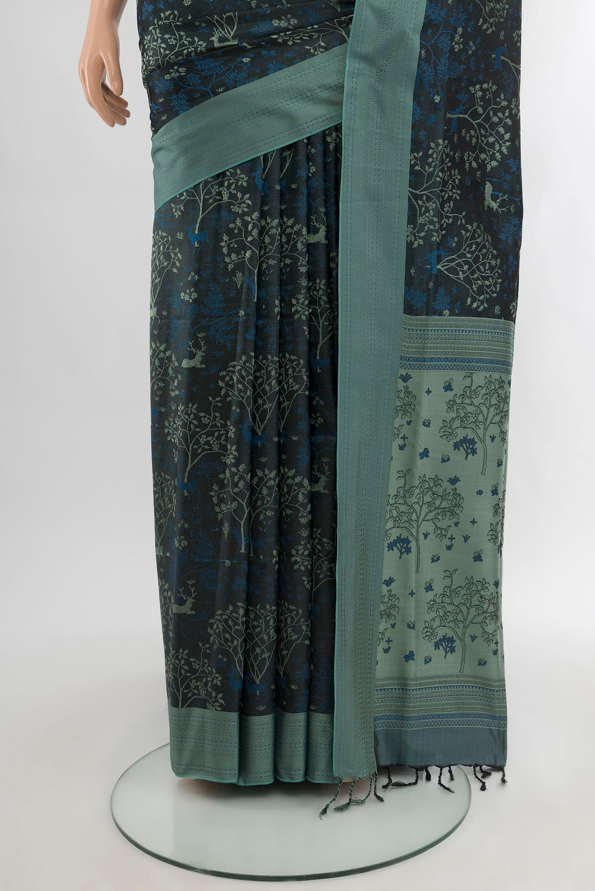 Pleats and pallu of Black Soft Silk Saree with Jacquard design on the body and Thread Border. 