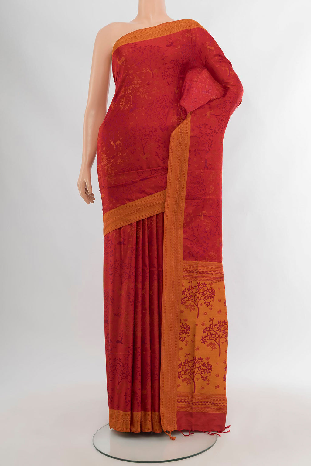 Red Soft Silk Saree with Jacquard design on the body and Thread Border.  displayed on a mannequin
